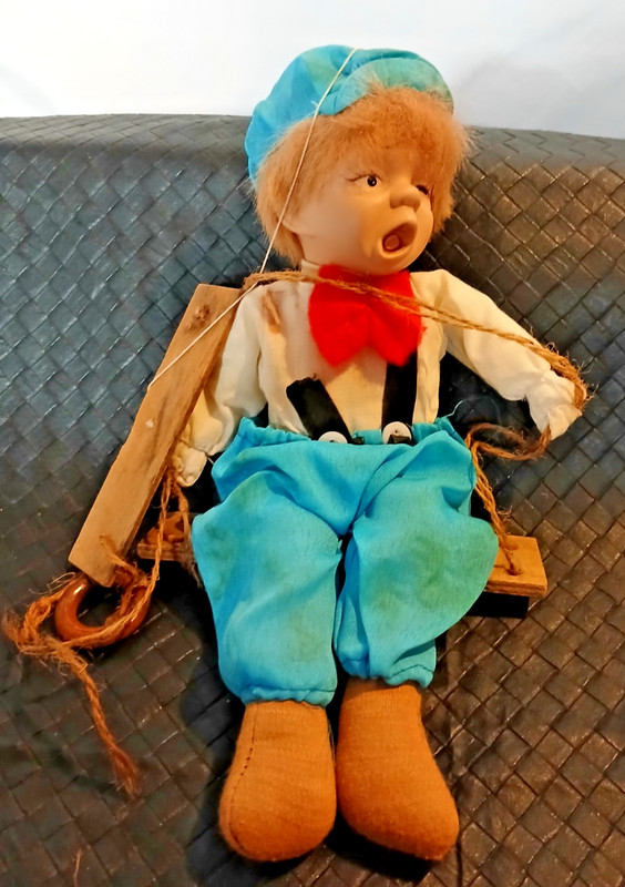Antique Doll on Swing