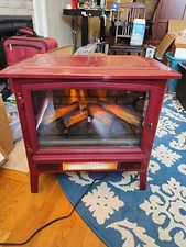 Red Duraflame Electric Fireplace Heater Used And Turns On 