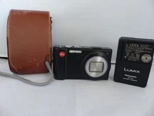 Leica V-LUX 30 14.1 MP - Black w/ brown Leica case. Looks great fully functional