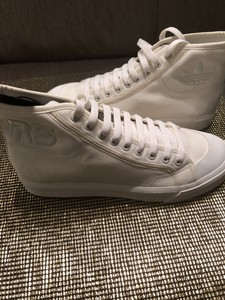 white canvas high tops