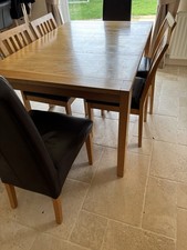 Wooden Extendable Dining Table with Six Chairs Bought From John Lewis