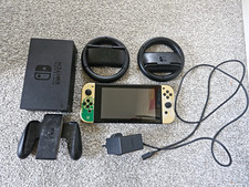 Nintendo Switch V1 32GB Console Bundle w/ Dock, Charger, Joy-Con Grip & 2 Wheels
