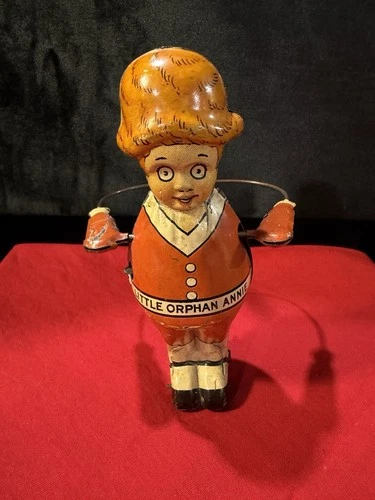 LOUIS MARX & CO “LITTLE ORPHAN ANNIE”  VINTAGE TIN WIND-UP TOY-IT WORKS