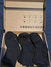 Brand new 12 pack of black socks, still in original box Size: XL kids Uk4/5
