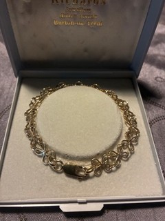 Repetierendes Gliederarmband im Schmetterlingsstil 9 Karat Gold