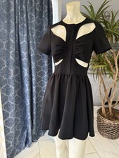 Black dress with cutouts & buttons (woman's XS, size 1-3)