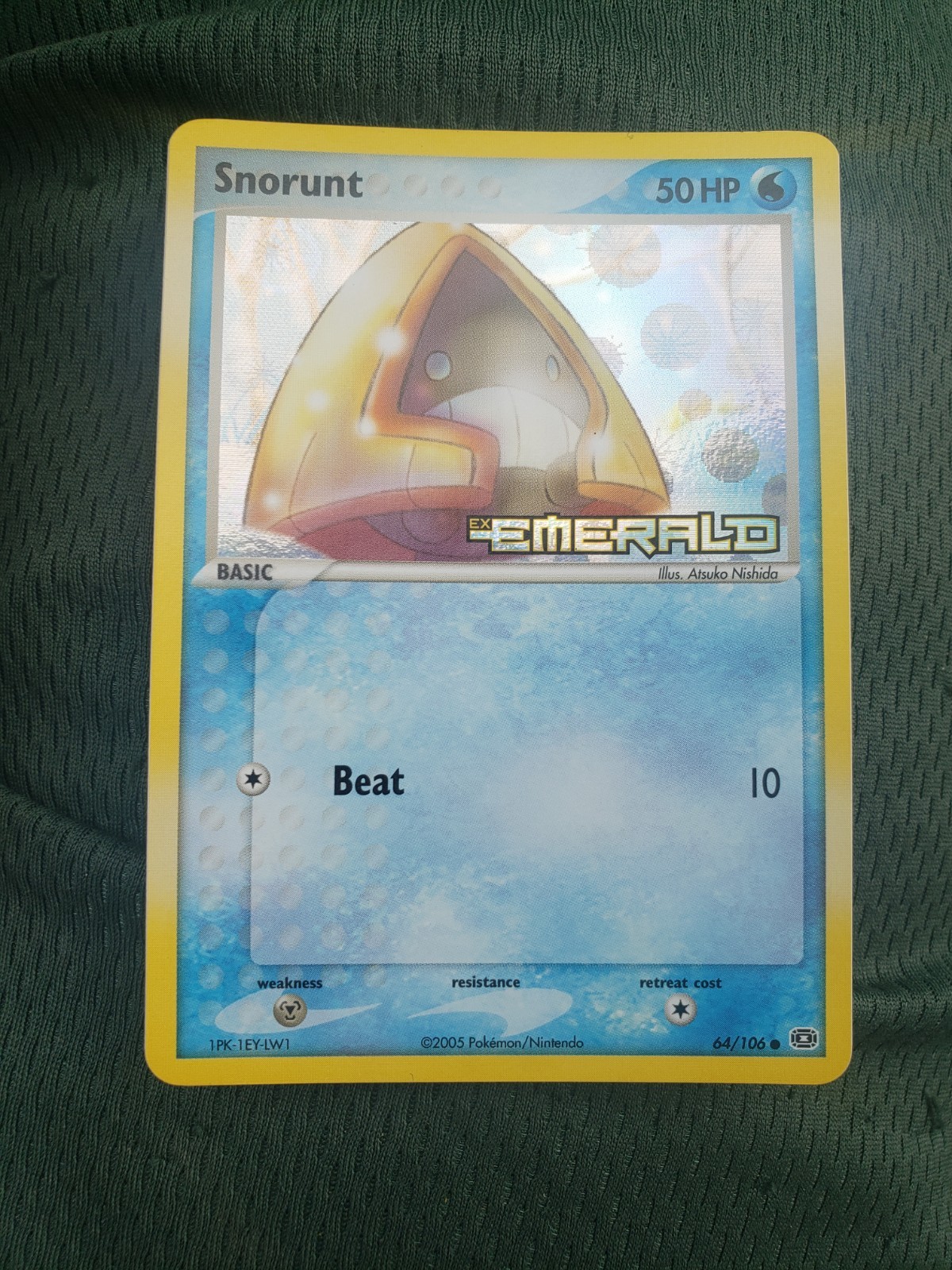 EX Emerald Snorunt Reverse Holo Stamped 64/106 NM