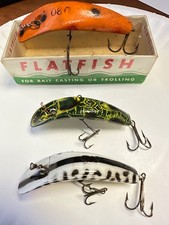 Flatfish 3 lures 2 are helin X5 and third one is U20 with box