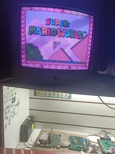SUPER NES WITH JAMMA ADAPTER  AND SUPER MARIO WORLD
