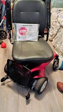 Red Jazzy Elite ES Power Wheelchair Charger included
