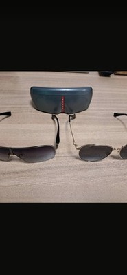 PRADA Herrensonnenbrille und GUCCI Damensonnenbrille 