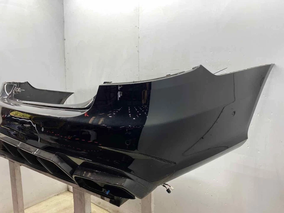 2014 - 2016 MERCEDES E63 AMG OEM REAR BUMPER COVER | BLACK (040) + CARBON FIBER - Image 4 of 4