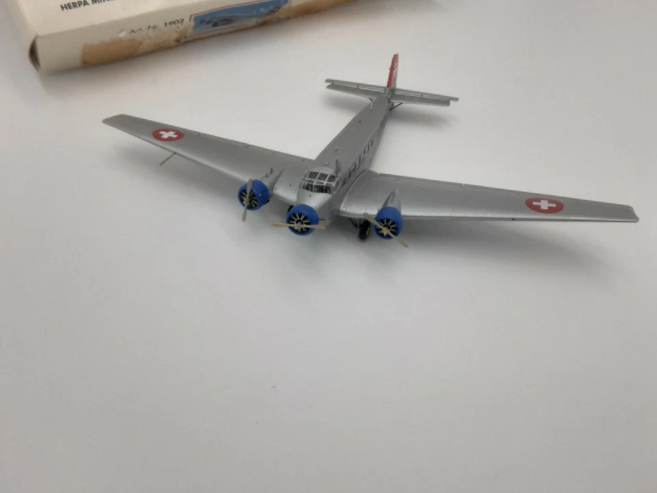 junkers JU 52/3m suisse herpa 1/160 boite carton usé sur un côté - Photo 2/4