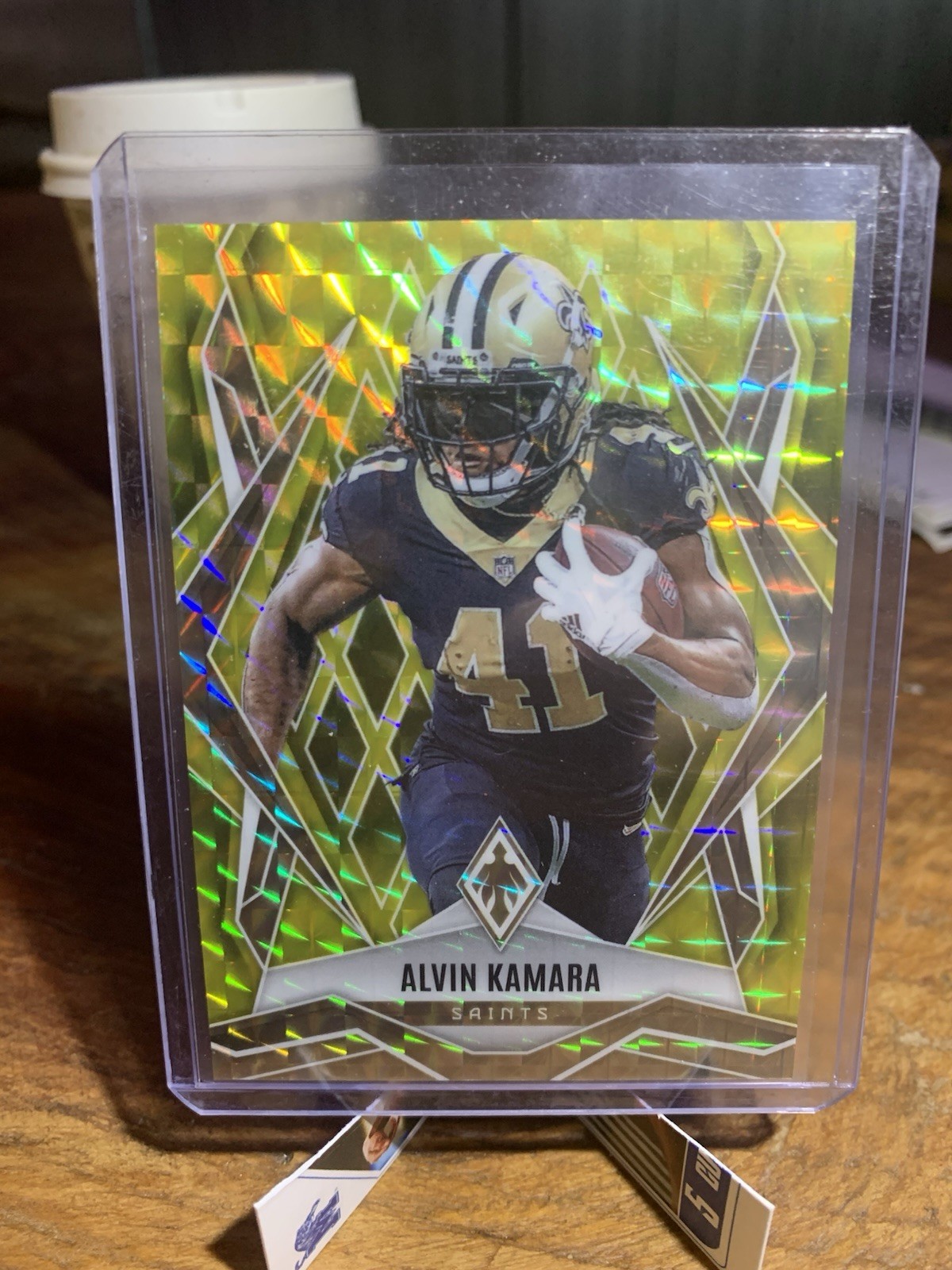 2025 Panini Phoenix - Alvin Kamara #22 Yellow Pyramids /185