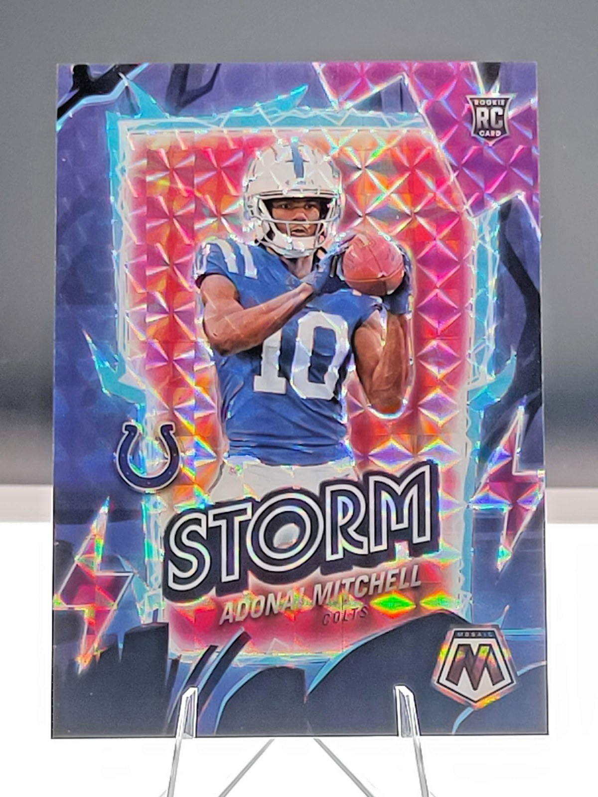 2024 Panini Mosaic Football Adonai Mitchell 7 'Storm' Purple Mosaic 27/49 Rookie