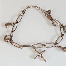 KIRKS FOLLY ADD A CHARM BRACELET  WITH FIVE CHARMS ADDED ROOM FOR MANY MORE WOW