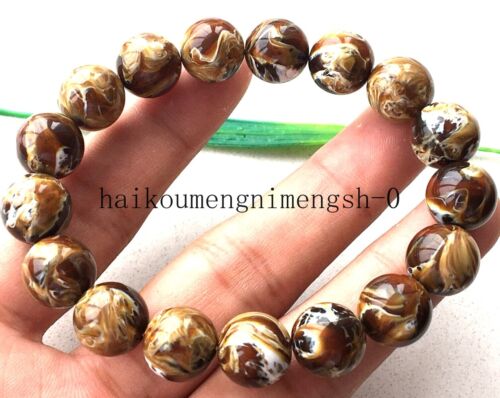 Bracelet perles Reiki ambrées cire d'abeille naturelle AAA 9-10 mm + certificat - Photo 1/7