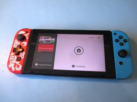 Nintendo Switch System Console w/Red & Blue Joy-Cons + Dock & Extras