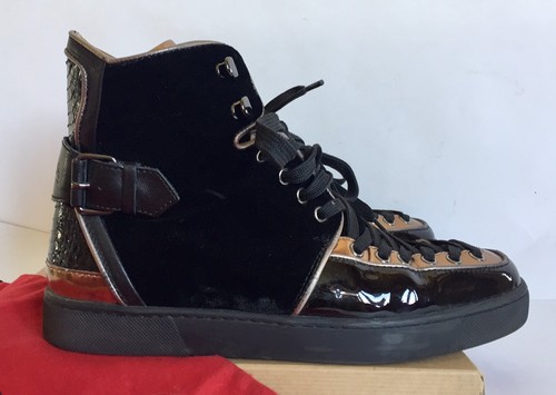 black python louboutin sneakers