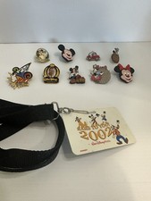 Disney Pin Lot With 2002 Badge