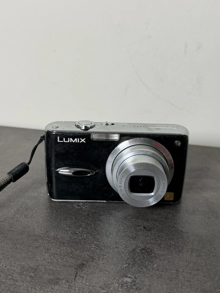 Panasonic LUMIX DMC-FX07 7.2MP Compact Camera WORKING, NO BATTERY, POOR CONDITI, photo 1 of 5