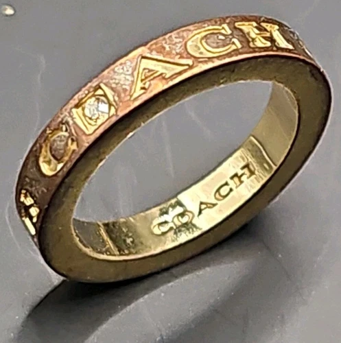 Anello impilabile fascia borchiata Swarovski metallo bicolore pavè marca Coach misura 7 25