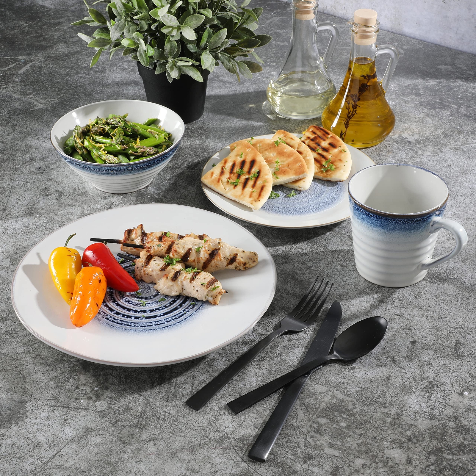 Gibson Elite Spiral Reactive Embossed Dinnerware Set Blue Service for Four 16pcs