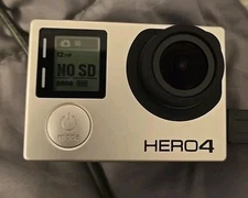 GoPro HERO4 Action Camera W/waterproof Cases/handle, Extra 2 Batteries, & Mounts