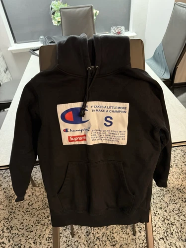 Petit sweat à capuche étiquette Supreme Champion
