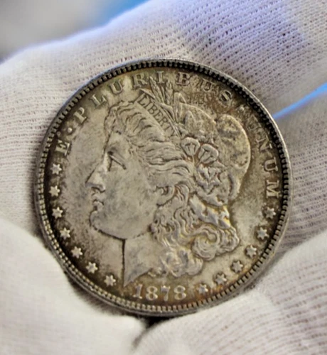 1878 7/8 TF Strong US Morgan Silver Dollar $1 Unc (Toned)