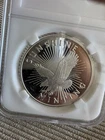 1 oz .999 Pure Silver Coin– Sunshine Mint – Sunburst Design - Toning ✨in Slab