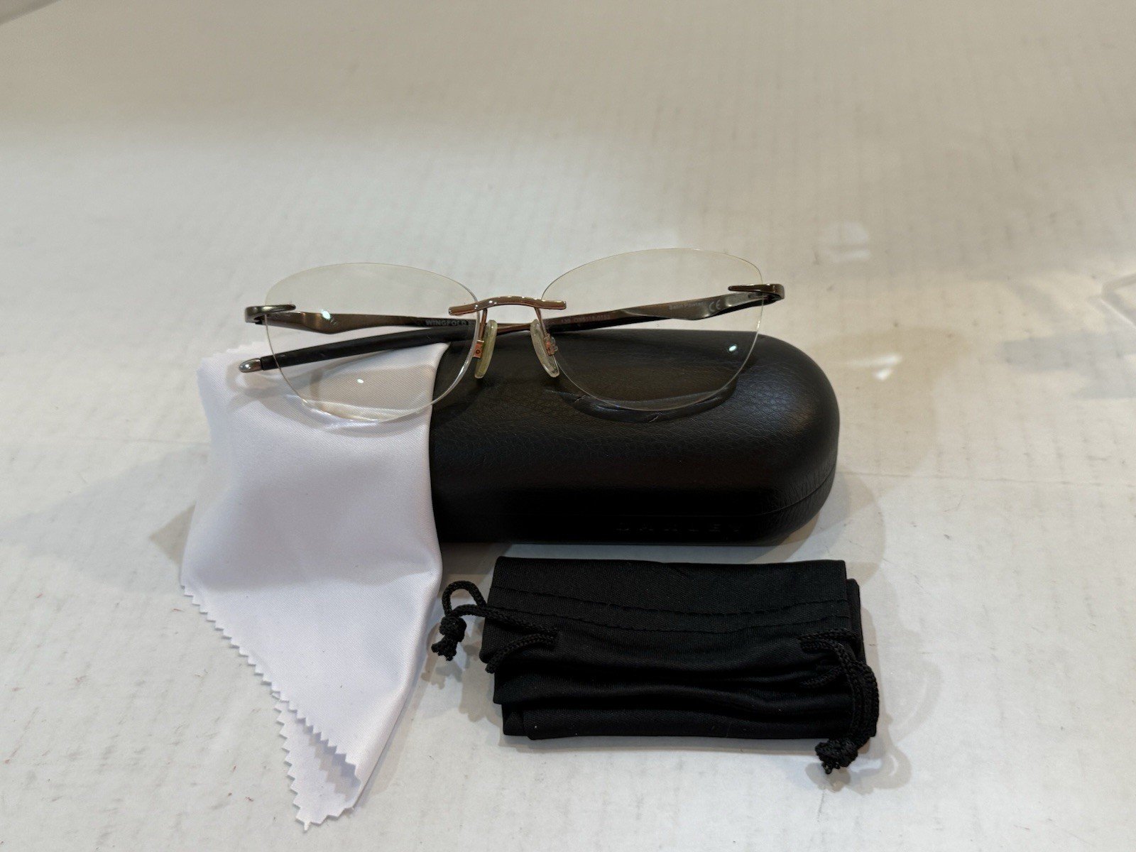 OAKLEY Titanium Eyeglasses WINGFOLD EVR OX5118-0453 Rimless Satin Pewter Frame