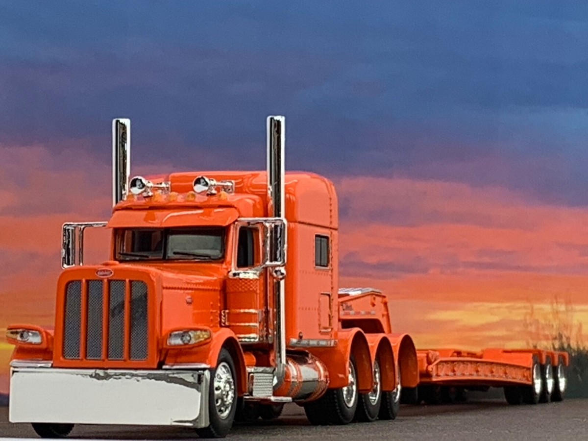 1/64 DCP PETERBILT 389 TRI AXLE 70
