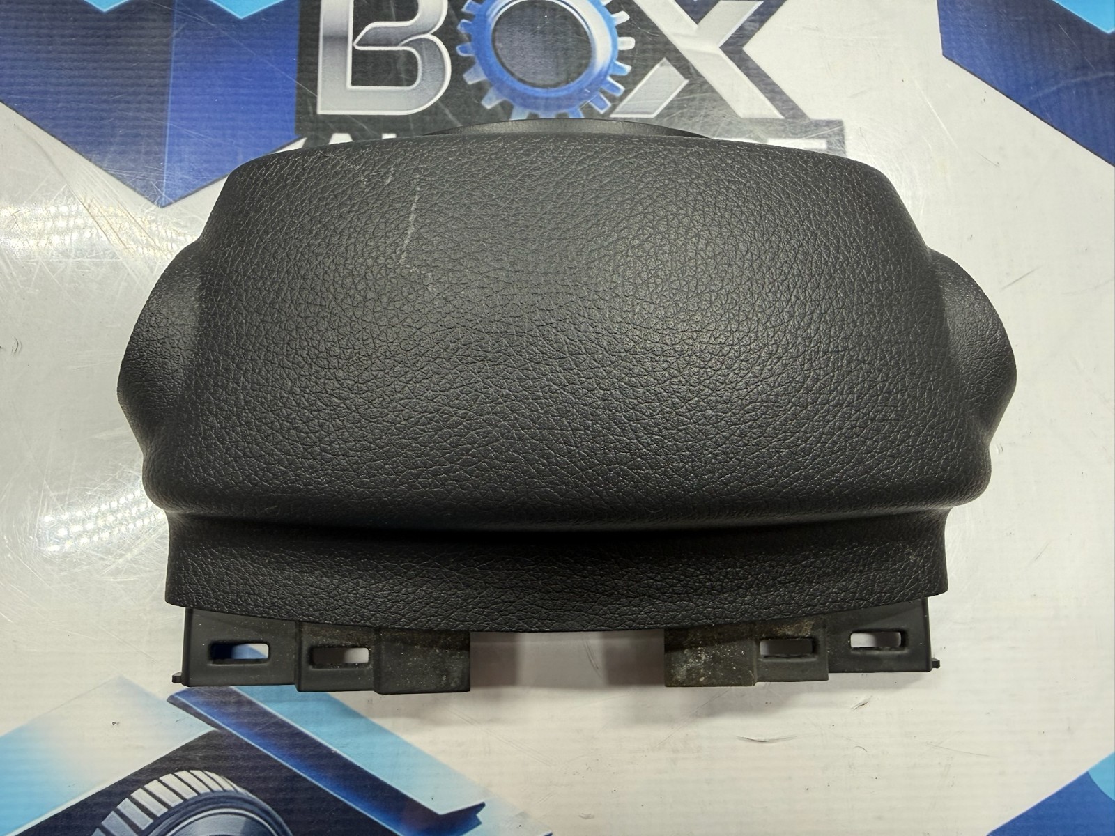 2014-2020 Nissan Rogue steering column top cover 484704BA0A OEM