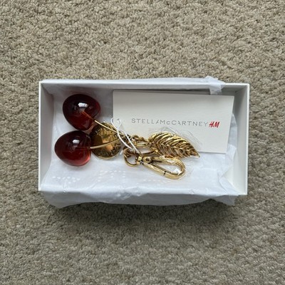 Stella McCartney x H&M Taschenanhänger Goldfarben Kirsche - Brandneu  
