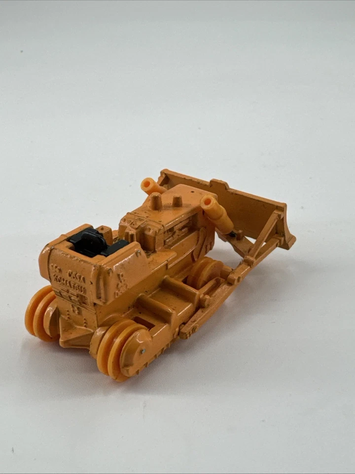 Bulldozer Tomica Komatsu D65A 1974 raro de colección sin pistas #70 1:87 Japón Foto 2 de 4