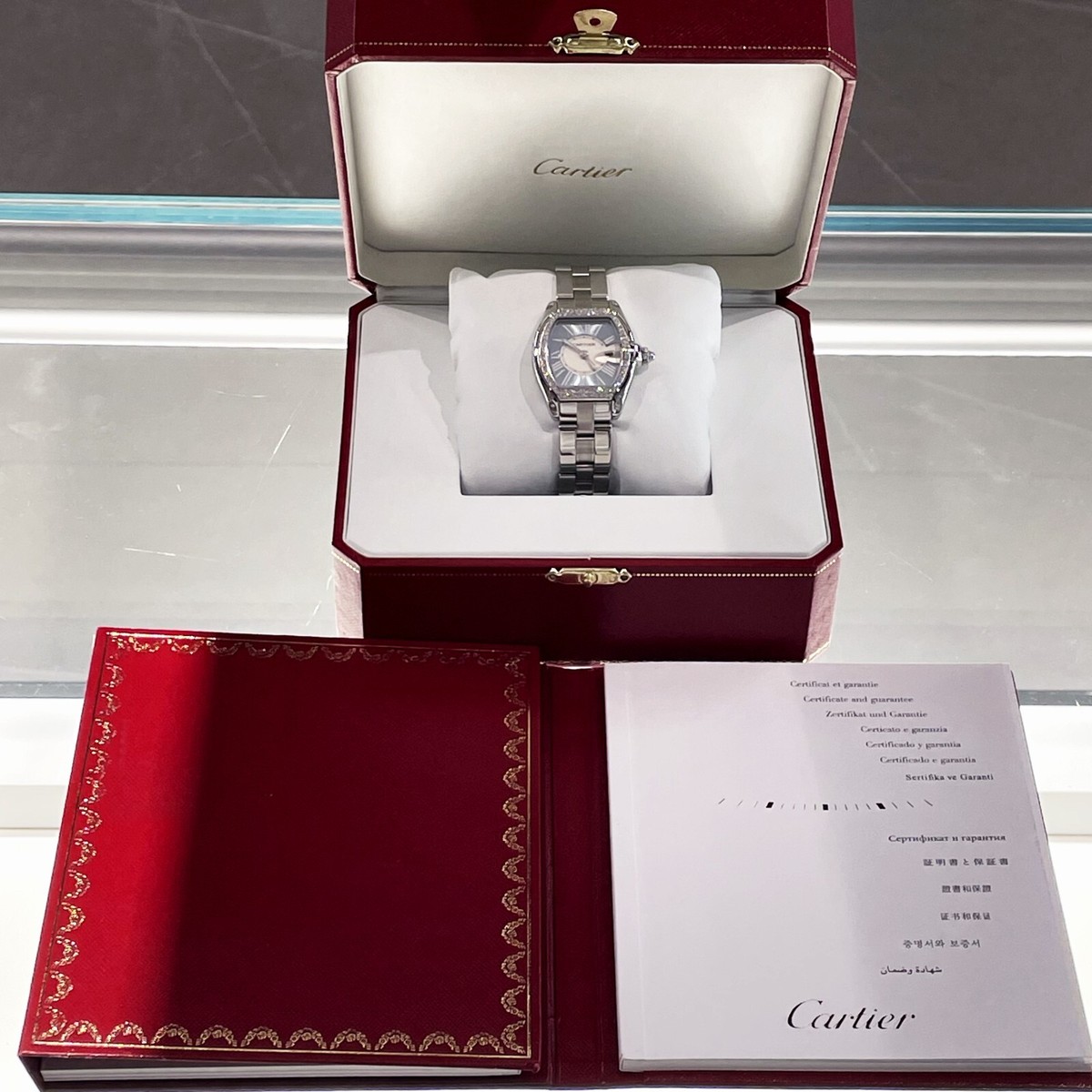 CARTIER ROADSTER LADIES BLUE ROMAN DIAMOND BEZEL STAINLESS ref