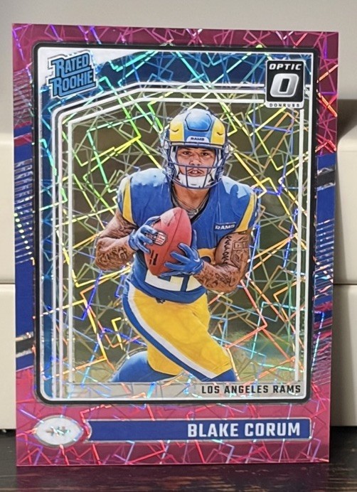 Blake Corum 2024 Panini Donruss Optic Rated Rookie Pink Velocity Prizm /80 #208