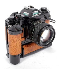 Canon A-1 35mm SLR Film Camera  nFD 50mm F1.4 lens  power grip  data back
