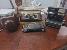 assorted vintage cameras lot Of 4 . For Parts Unsure Of Working Condition.