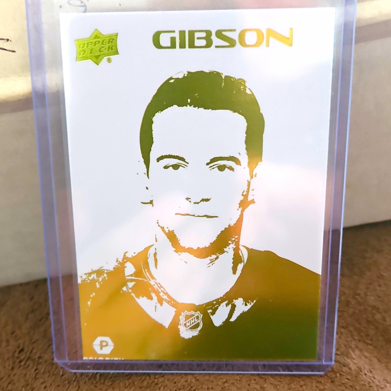 Upper Deck 2026-27 Series 1 Stencils John Gibson ST-43 Yellow #061/299