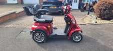 green mobility scooter used in fair condition