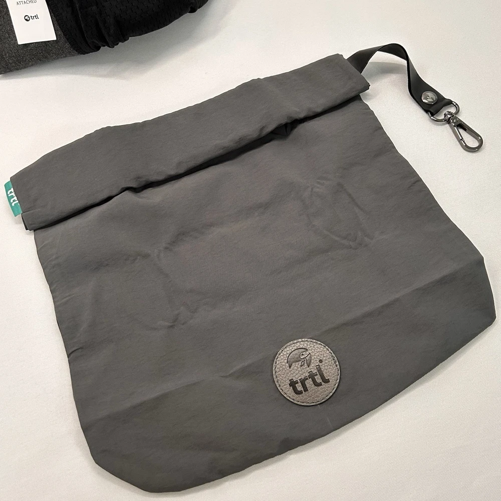 TRTL Travel Pillow for Neck Support on Airplanes Includes Dust Bag