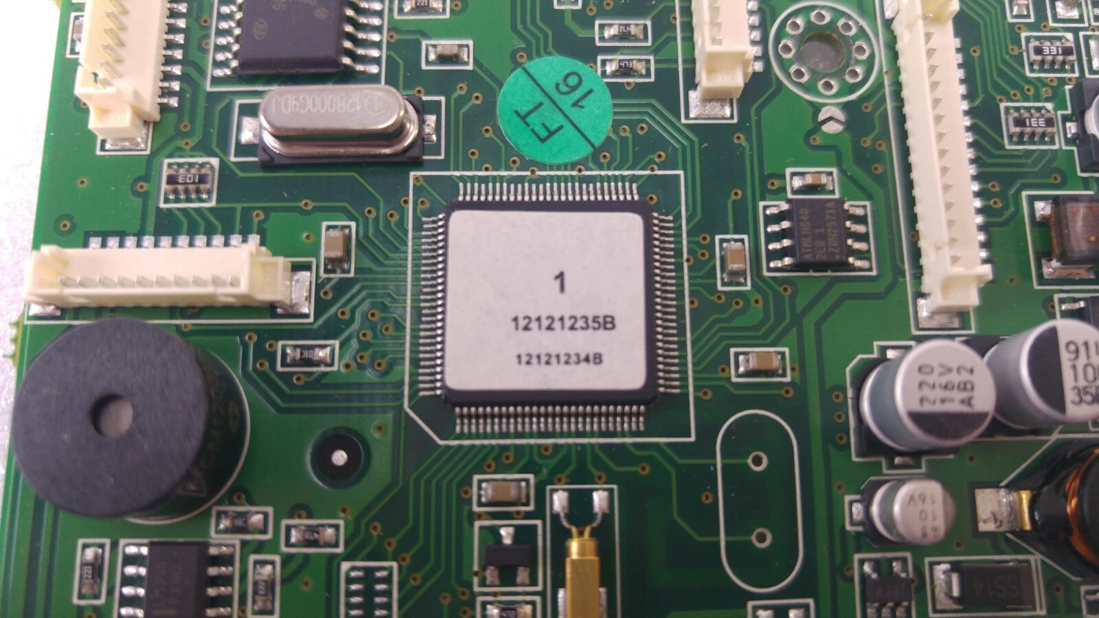 Processor with sticker 12121235B and 12121234B, crystal and connectors