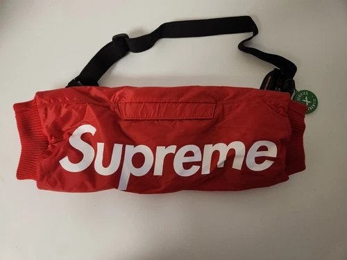 Chauffe mains Supreme rouge neuf avec étiquettes