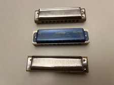 Quantiy of 3 used 10 hole harmonicas 2-Hohners A and C and 1- EastTop Blues B