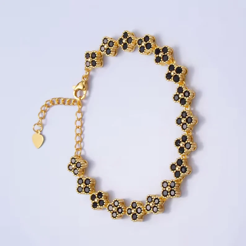 Brazalete de cadena de tenis de diamantes negros simulados redondos de 5 quilates enchapados en oro amarillo de 14 k Foto 3 de 4