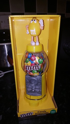 m&ms small yellow sweet/candy/coin bank dispenser new and