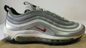 silver nike costo