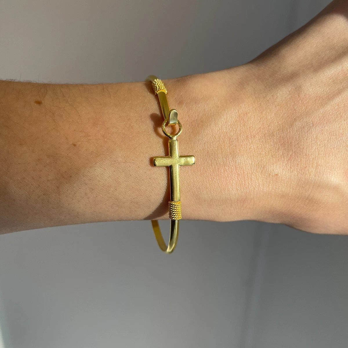 Cross bangle hotsell bracelet